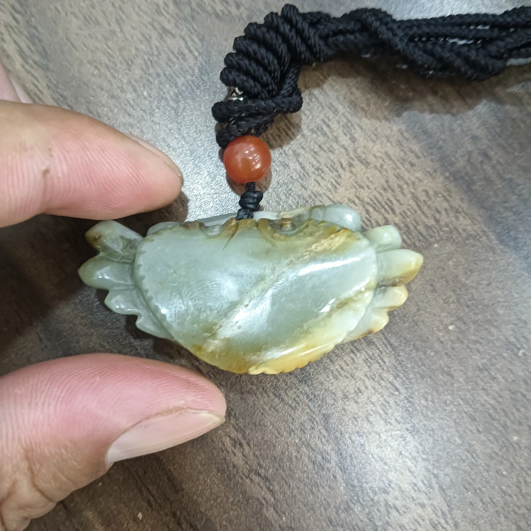 新疆和田玉八方来财吊坠