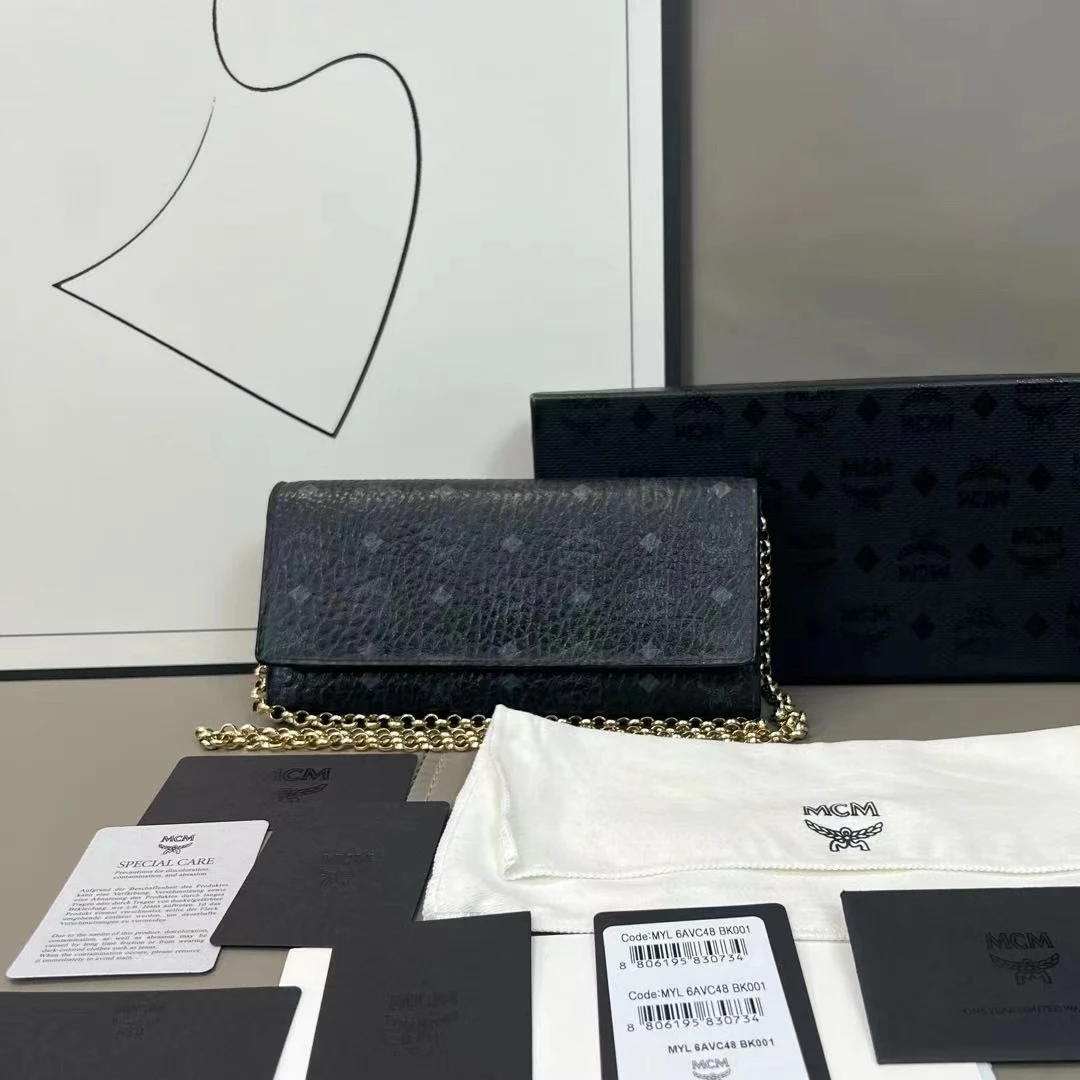 95新 MCM 黑色长款三折钱包/77899206