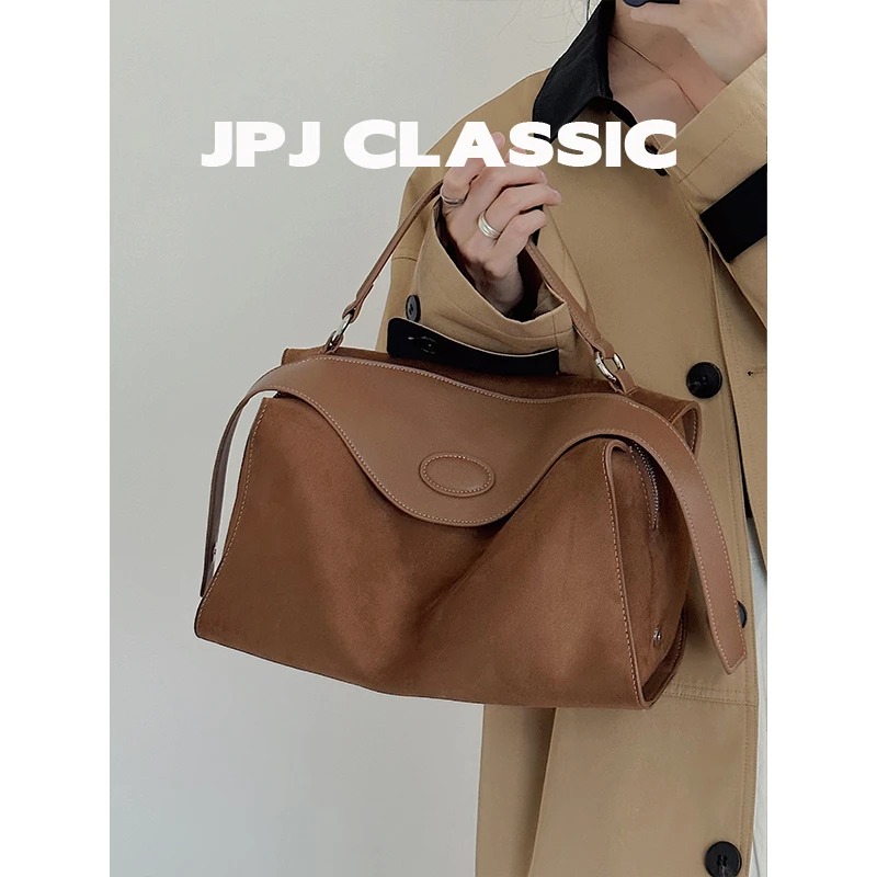 jpj新品牛皮波士顿包女单肩斜挎枕头包复古风手提通勤包1536