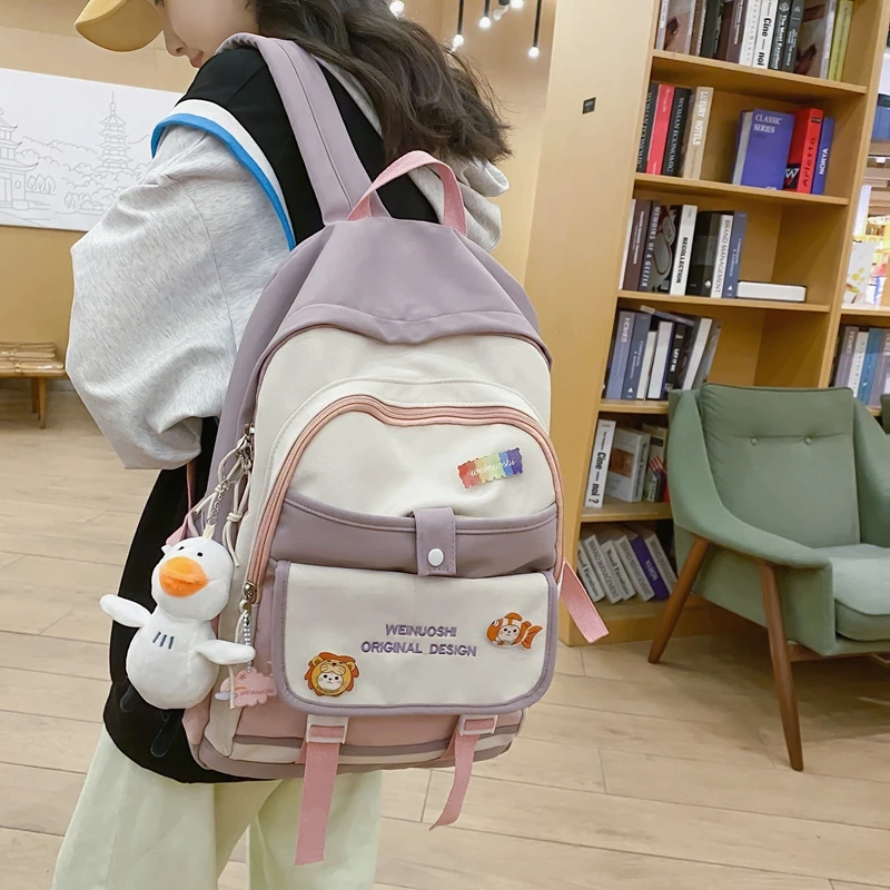 书包女高中生初中生中学生小学生女生大容量可爱双肩包背包大学生