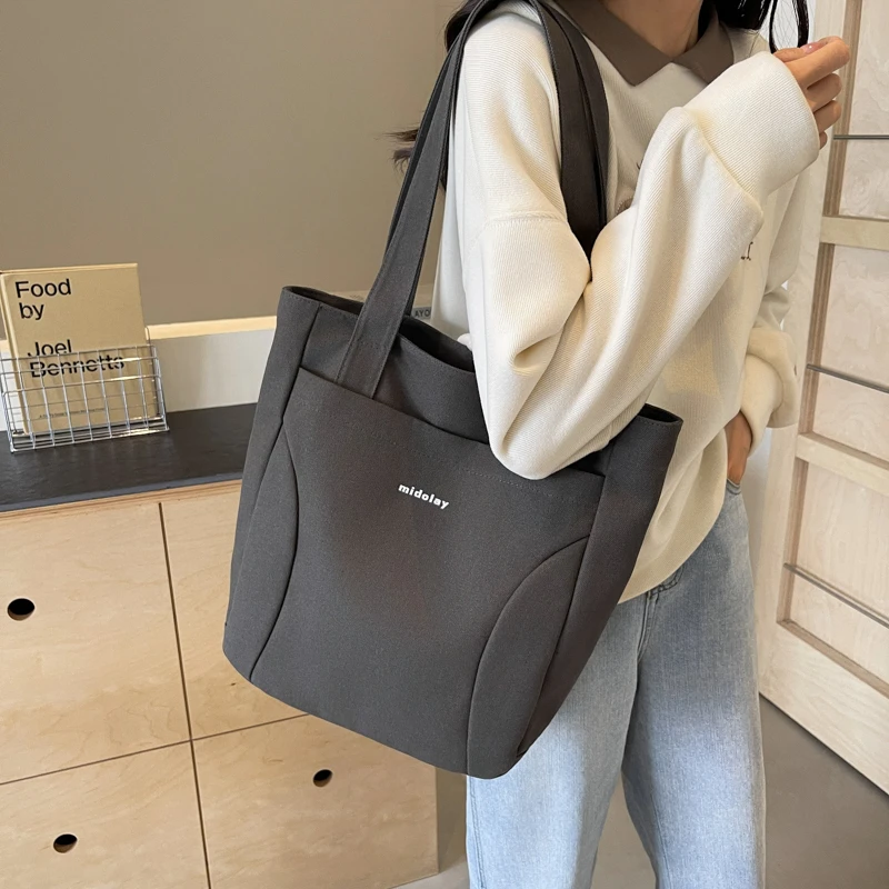 日系慵懒风帆布包包女2024新款潮大容量学生上课通勤包单肩托特包