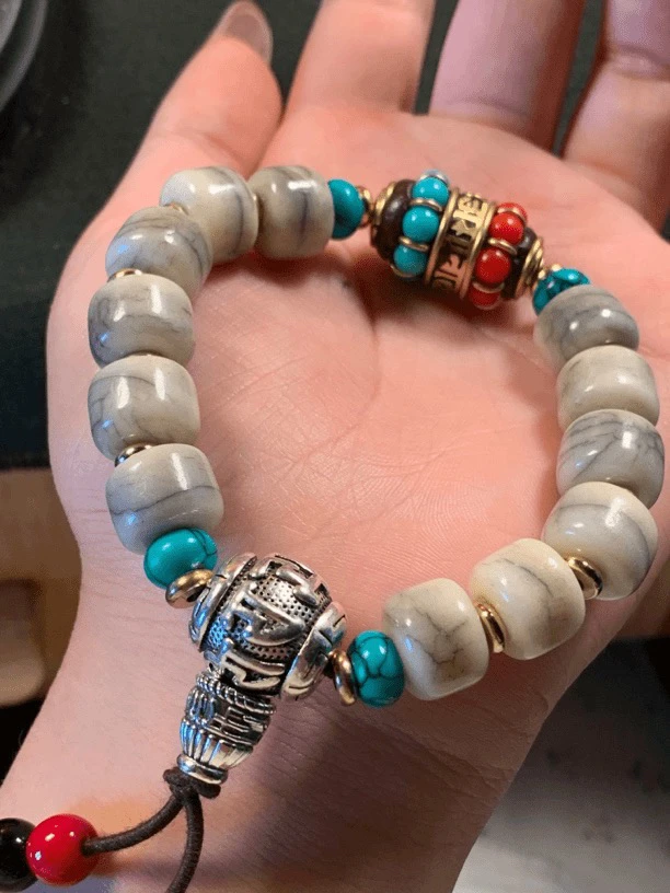 藏式娘啦擦擦工艺品泥塑