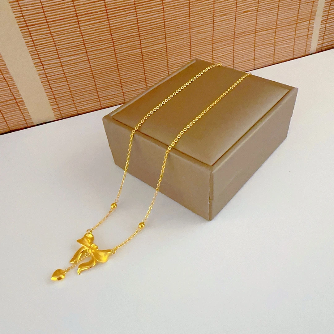 足金黄金 经典时尚 在逃公主 爱心蝴蝶结 百搭套链