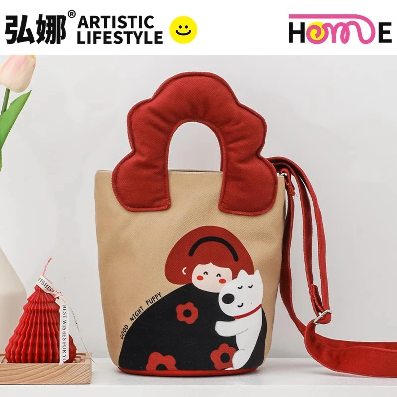 弘娜X小雪丽 原创搞怪表情时尚手提单肩水桶包印花斜挎包包女通勤