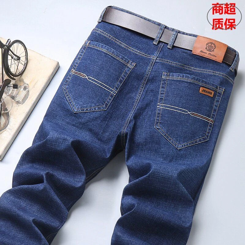 秋冬新款宽松弹力直筒男牛仔裤子胖子加大码耐磨春夏加肥牛仔裤