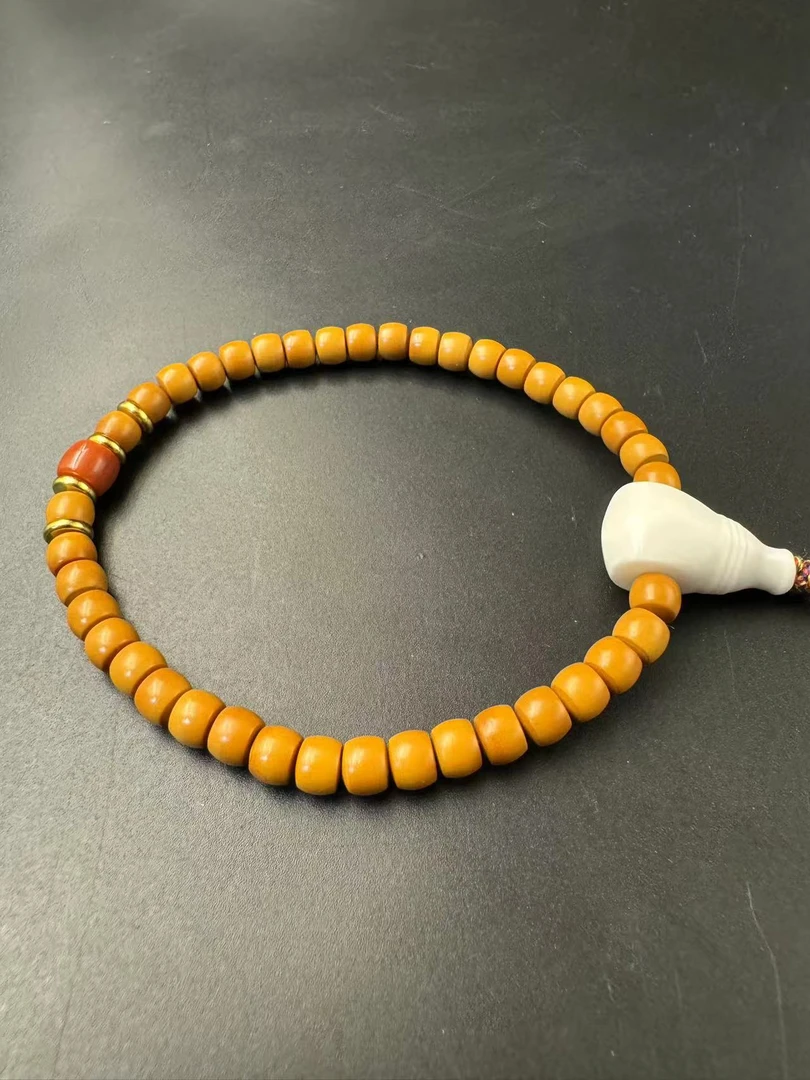 5.8清水橄榄核尖手串