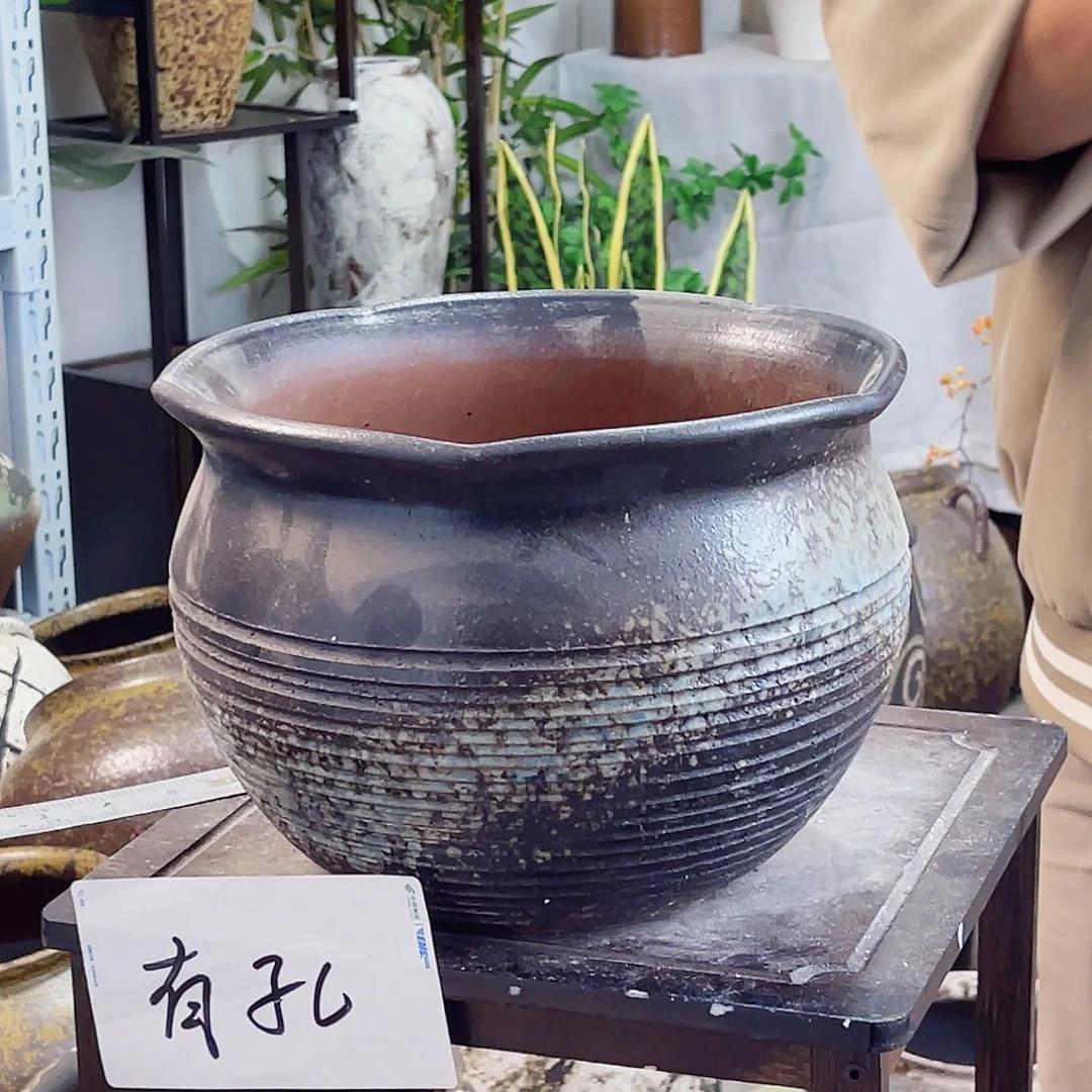 紫砂花盆高度18口径25。