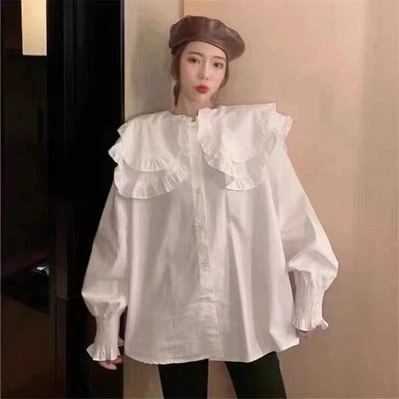 新款时尚双层娃娃领衬衫一件