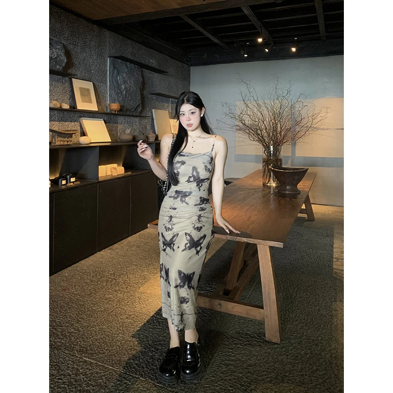 黑泽玄七微胖mm2023夏季新款气质蝴蝶印花吊带连衣裙女98232L1877