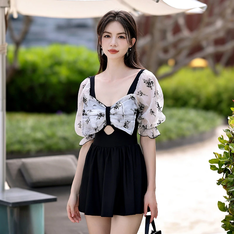 微胖mm泳衣女大码遮肚显瘦蝴蝶结连体平角裤度假2024女泳衣保守型