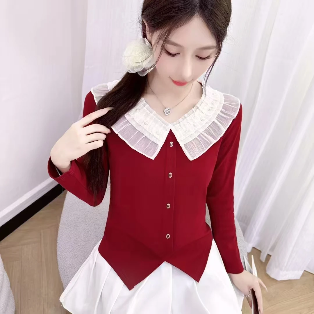 女士休闲娃娃领小衫时装版