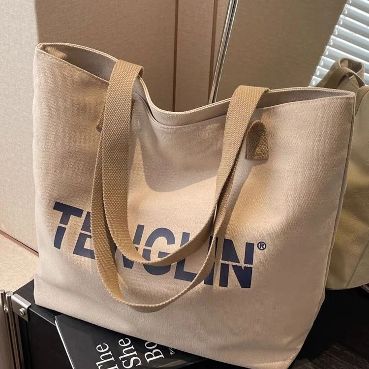 休闲简约大容量包包女2024新款百搭字母学生上课通勤托特包帆布包