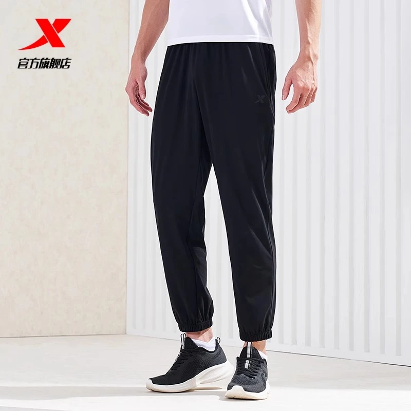 特步速干运动裤男春秋新款健身训练透气男子针织长裤休闲裤