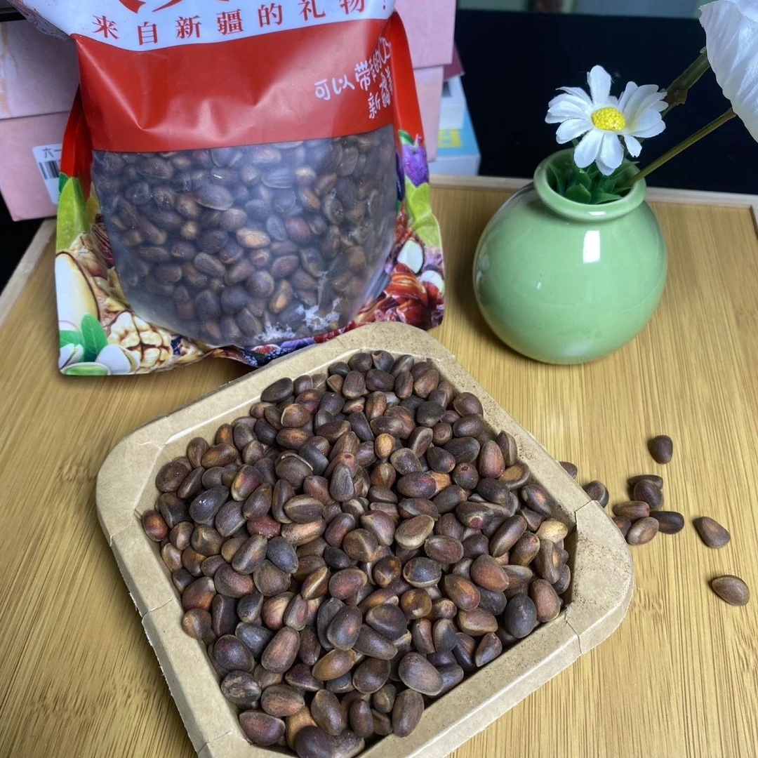 包邮野生新疆阿勒泰哈巴河生松子1000克大粒特产零食不开口