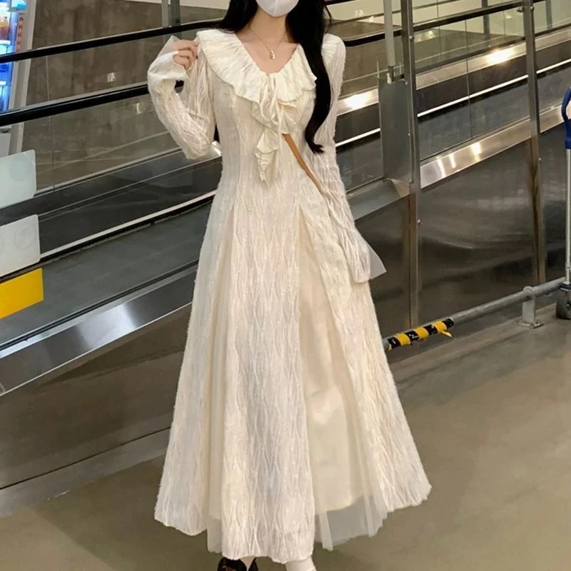 法式温柔气质显瘦长款仙女连衣裙秋冬纯色荷叶边V领加绒打底长裙