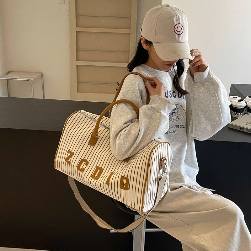 短途旅行包男女大容量帆布时尚轻便行李包手提外出出差旅游收纳包