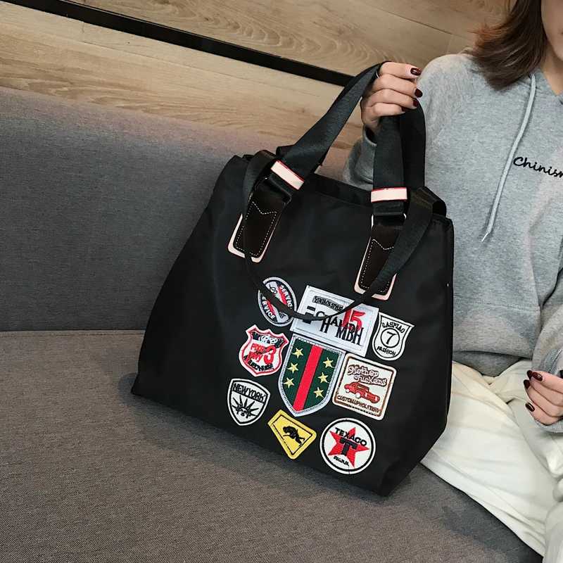 韩版女手提大包单肩包防水牛津纺电脑购物袋徽章大包住宿小行李袋