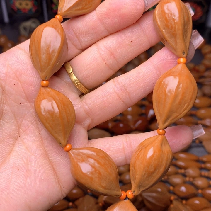 橄榄核核雕三花手串
