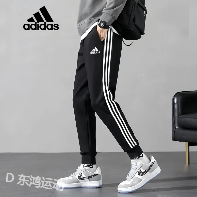 adidas/阿迪达斯秋季男士时尚百搭潮流侧边条纹束脚冬季休闲长裤