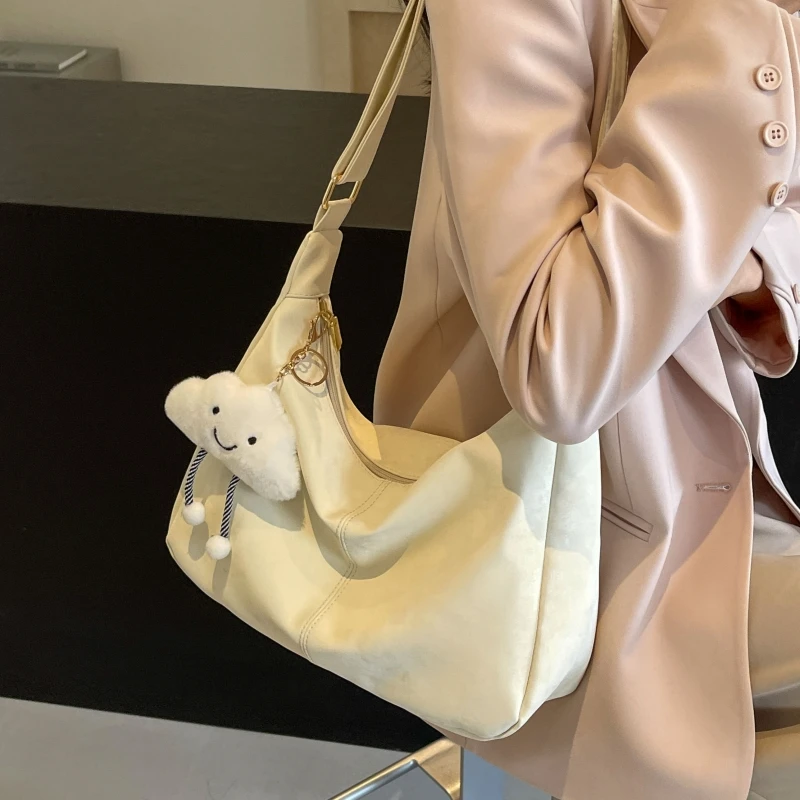 大容量包包女式2024新款夏季百搭单肩包女款大包饺子包通勤斜挎包