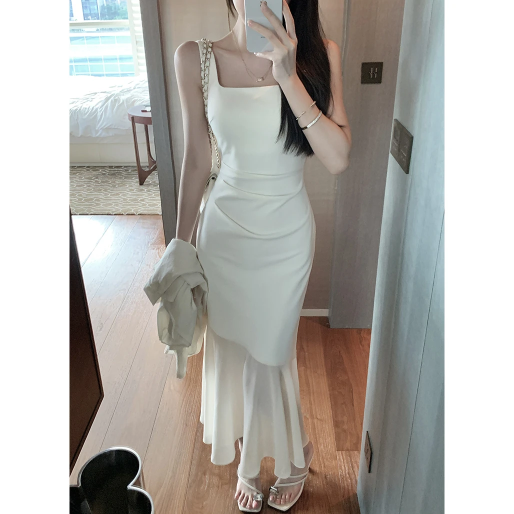 白色拼接吊带连衣裙女夏季法式气质性感收腰修身鱼尾长裙