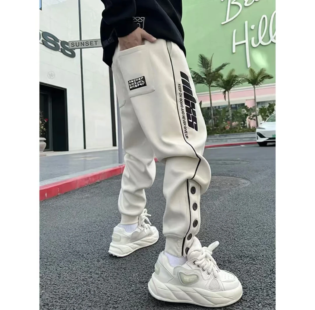 高街潮牌运动休闲裤男秋季新款字母痞帅宽松百搭时尚简约小脚卫裤