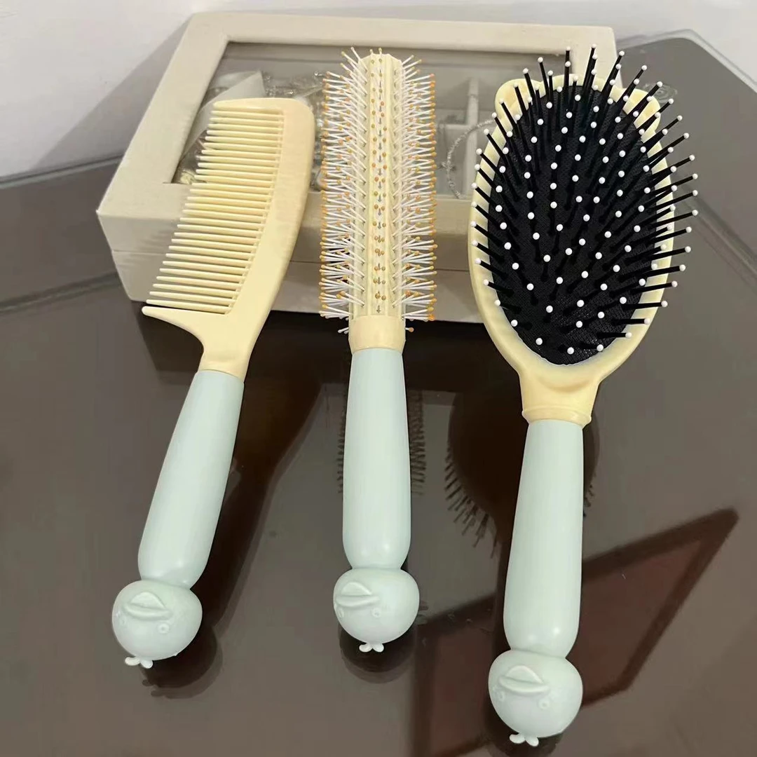 新款可爱趣萌鸭高颜值卷发蓬松防静电美发学生宿舍新款气垫梳子