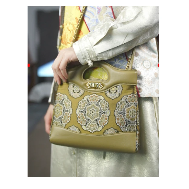 【万象有衣】设计师款手提包6297