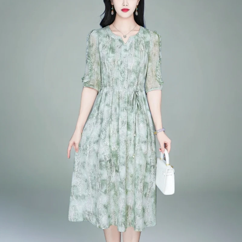 2025年夏季新款气质收腰显瘦设计感木耳边拼接中长款印花连衣裙子