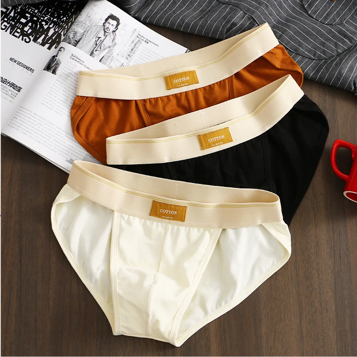 新款纯色男士内裤宽松男三角裤棉简约潮男生大码三角裤舒适纯棉