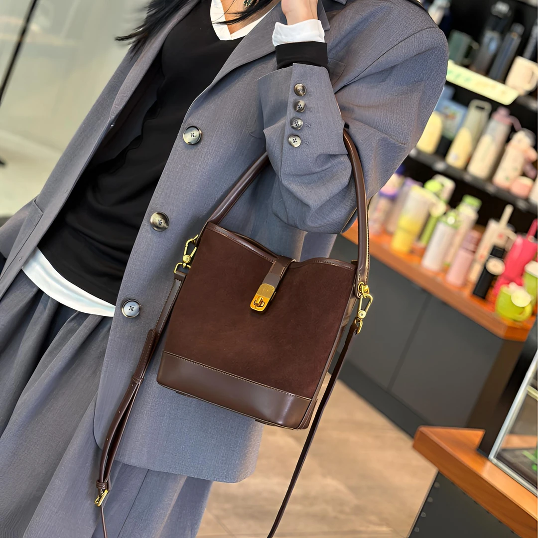 3528/新款手拎包单肩斜挎时尚百搭真皮复古休闲女士简约桶包