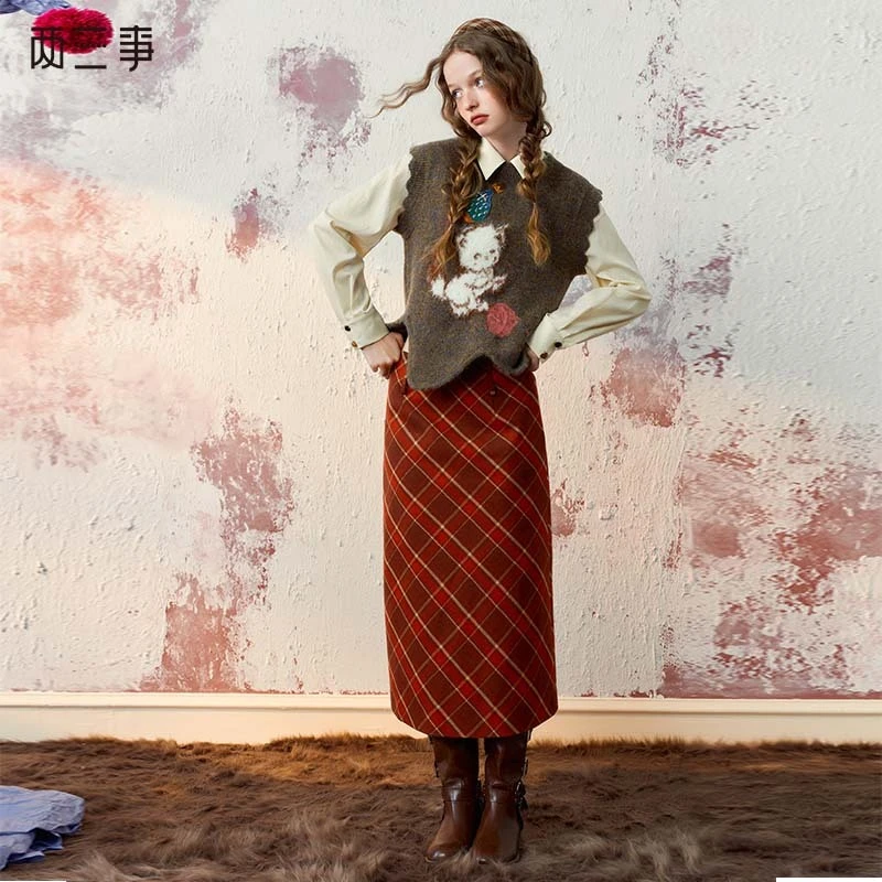 两三事磁场逆转2023冬季新款复古格子毛呢高腰半身裙气质长裙