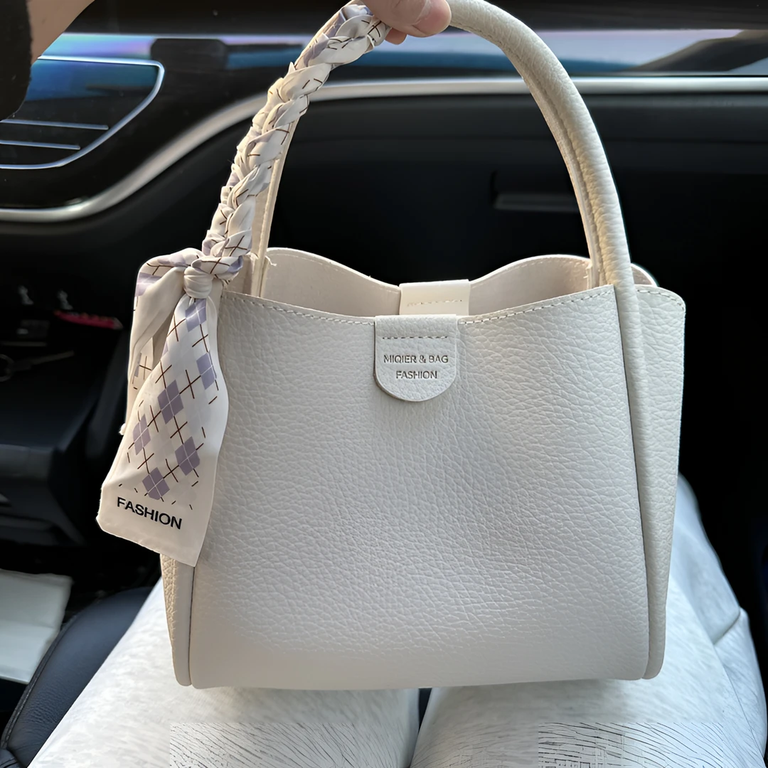 2025夏新款时尚手拎包水桶包简约小众手提包包白色女士单肩斜挎包