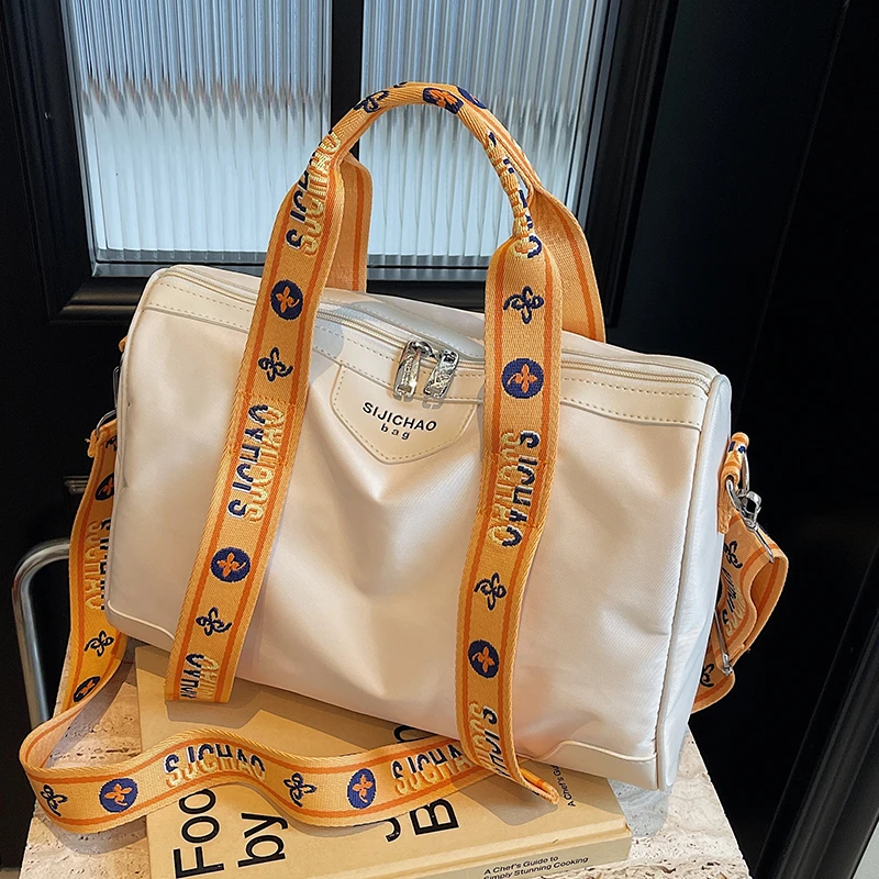 轻便百搭简约帆布单肩旅行包包女2024秋冬新款大容量斜挎波士顿包