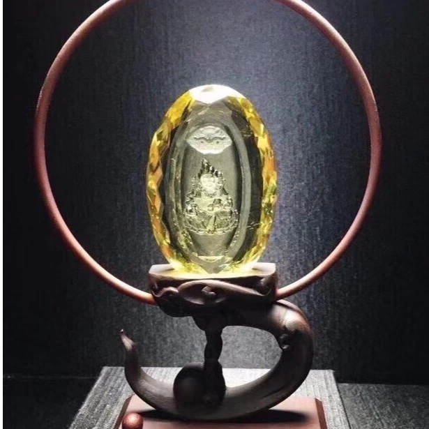 天然黄水晶千禧面切工财神 规格77*50*17mm 重98克