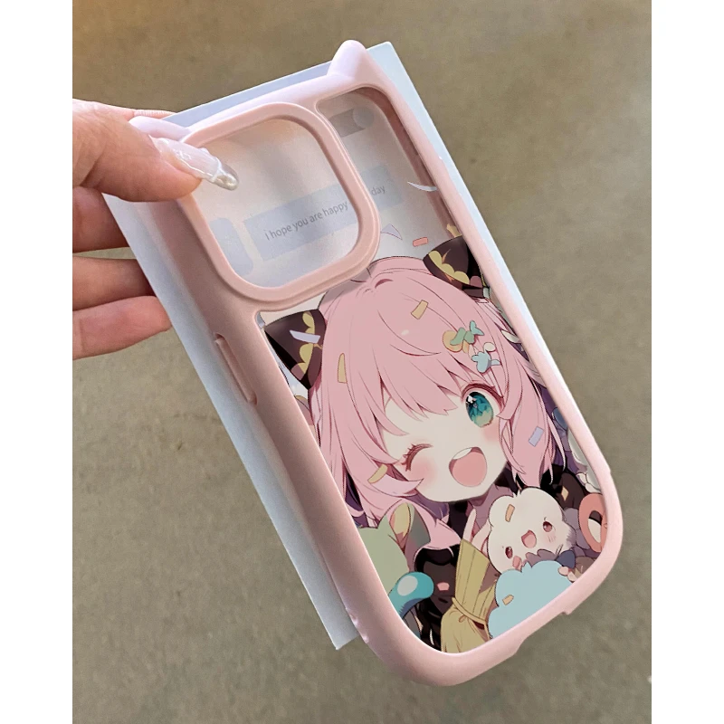 欧克里里眨眼阿尼亚苹果15手机壳iPhone14/13立体猫耳朵12/11粉框