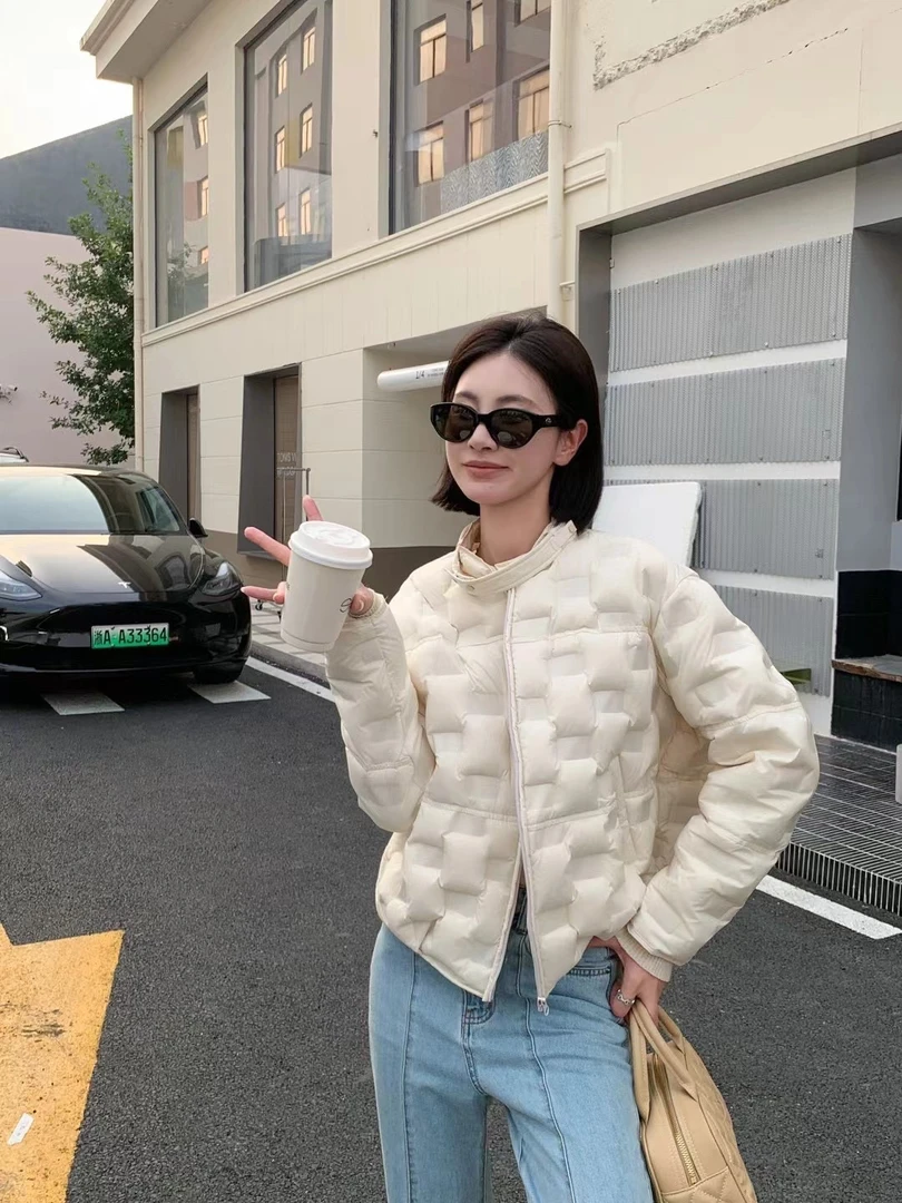 雪姐服饰「压胶羽绒服」秋冬新款休闲风时尚羽绒服女经典保暖外套