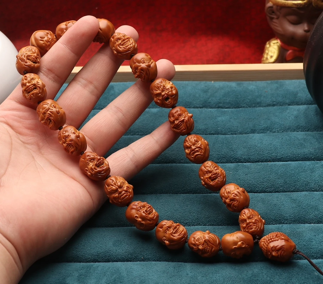 橄榄核手工雕刻恶僧佛爷手持老油核老料尺寸1.6*1.8cm核雕佛珠男