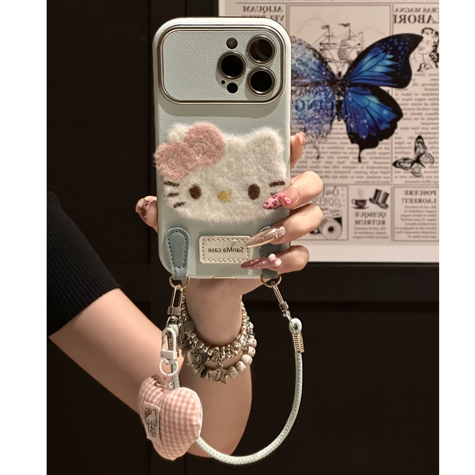 卡通可爱KT猫刺绣适用苹果16pro手机壳手绳可爱iPhone15创意14女