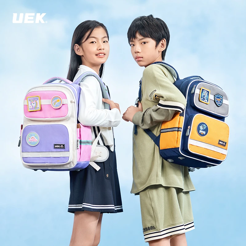 UEK小学生书包1-3一6年级2024新款护脊减负男童女孩双肩儿童背包