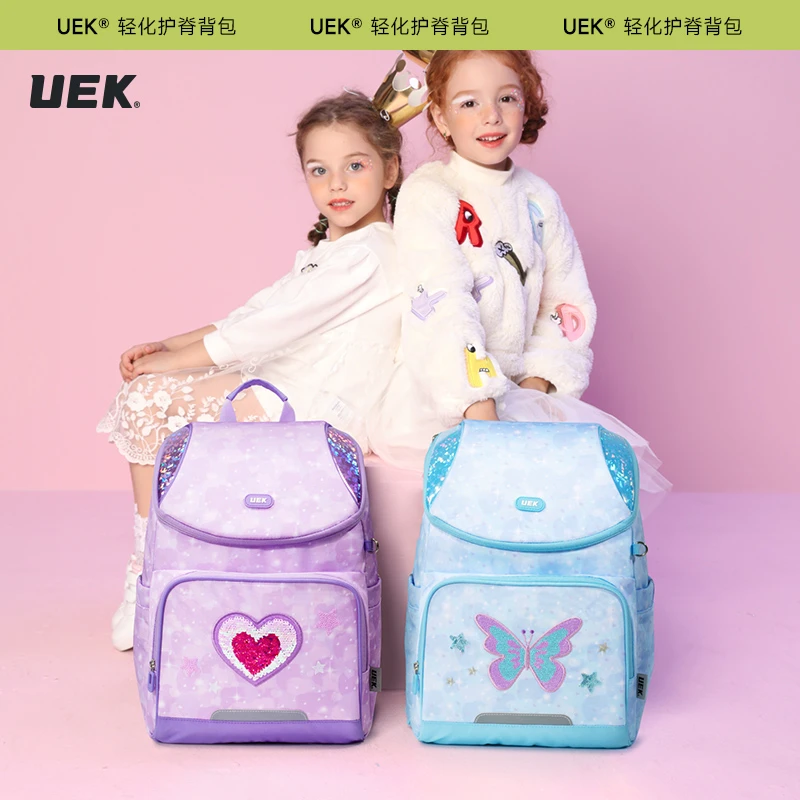 uek超轻书包小学生儿童减负护脊轻便女孩双肩包休闲