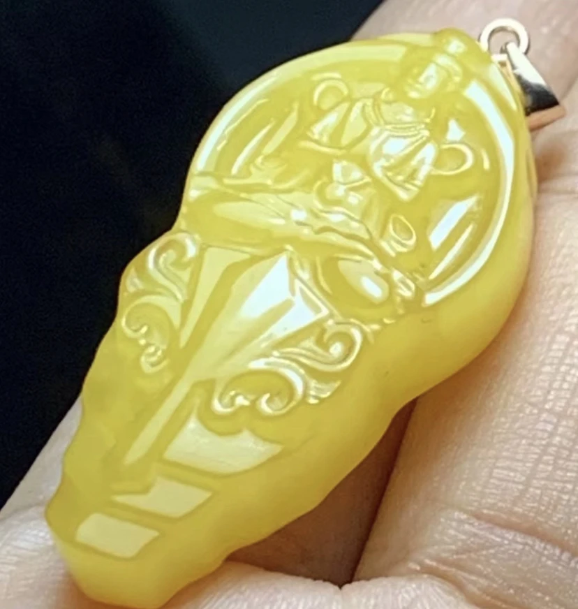 蜜蜡镶嵌S925银扣头吊坠