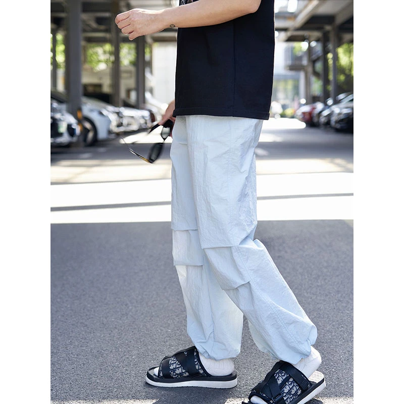 Cookawu2024夏季半松紧腰微褶皱速干水蓝色束脚口降落伞裤