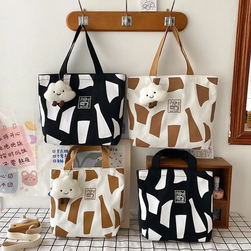 包包女新款日韩版小清新化妆包收纳袋便当包百搭女生手提袋帆布包