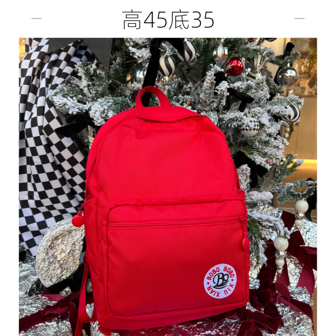 红色休闲大双肩包学生包