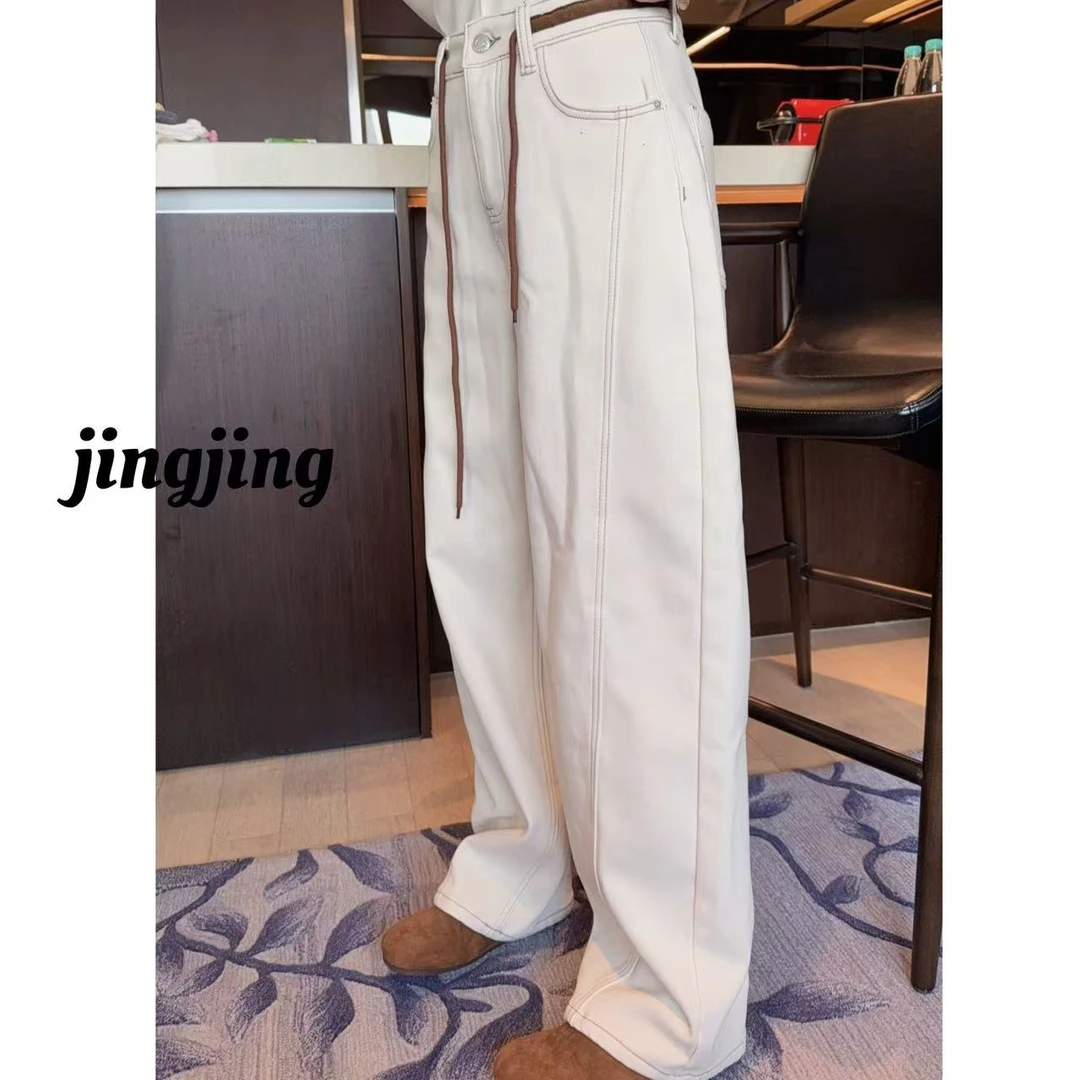 秋冬新款休闲百搭加绒加厚小弯刀牛仔裤（29058）