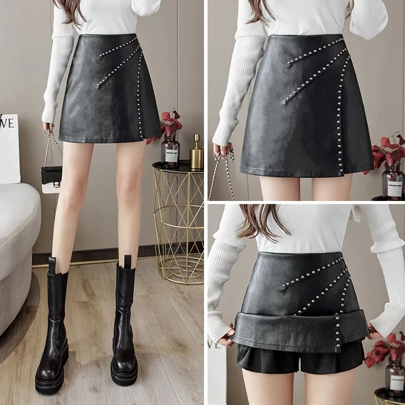 704高腰半身裙A字皮裙春秋显瘦防走光黑色时尚铆钉不对称短裙子冬