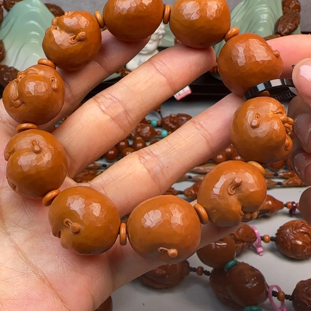 橄榄核核雕H****r2.0尺寸油核百态胖爷