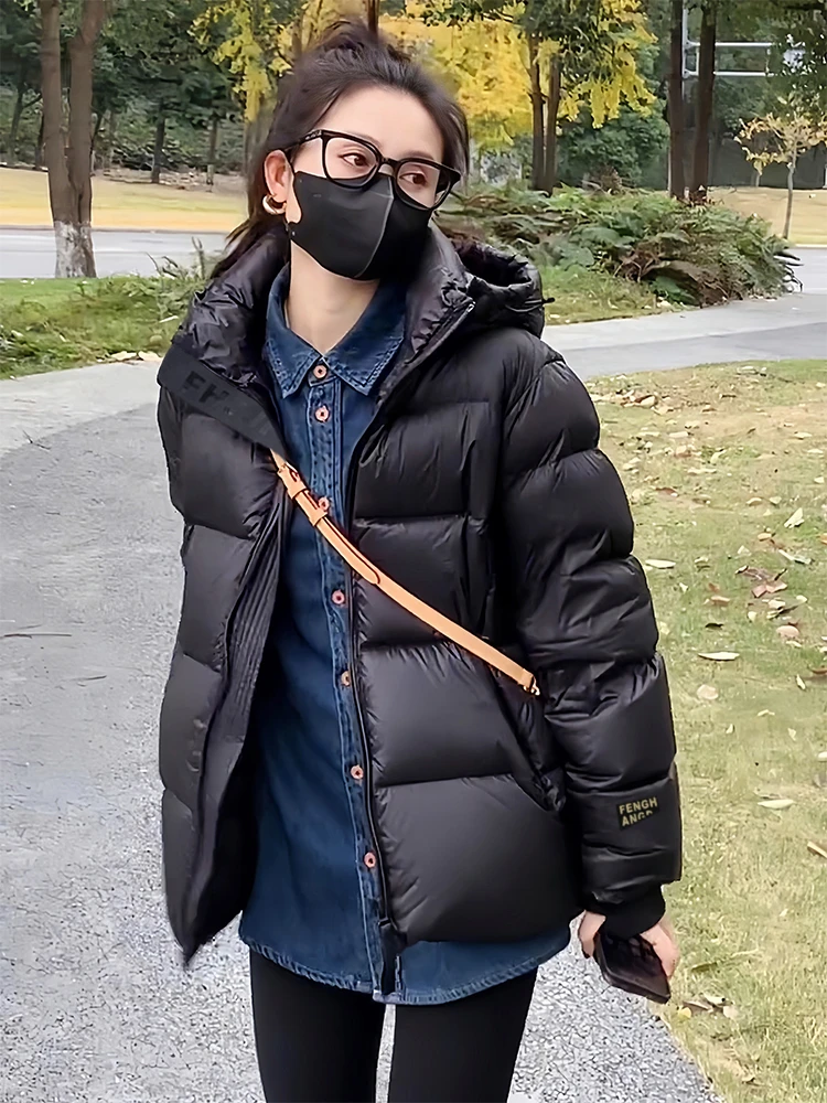 黑金鸭绒高级感羽绒服韩版男女情侣款超保暖冬季新款厚外套