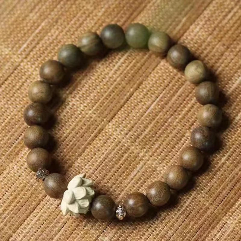 ..经典圆珠莲花坠手串..............